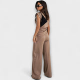 Asymmetrical Ensemble with Dramatic Shoulders