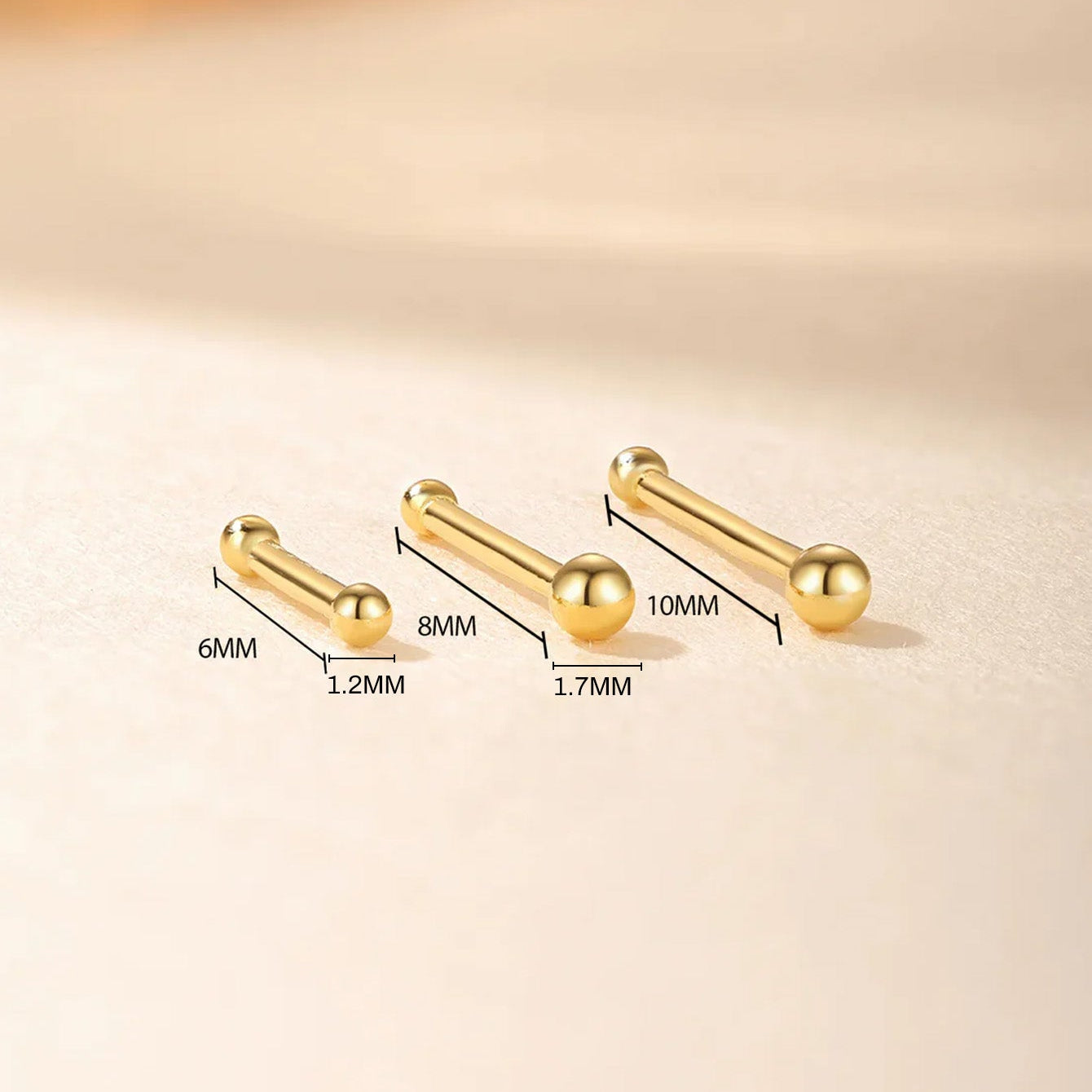 Isabela – Boucles d'oreilles en or au design élégant et aérien.