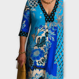 Robe Élégante à Décolleté et Motifs Uniques