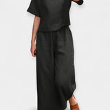 "Ensemble Aérien avec T-shirt à Manches Courtes" could be rewritten as "Ensemble Léger avec T-shirt à Manches Courtes".