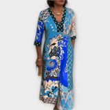 Robe Élégante à Décolleté et Motifs Uniques