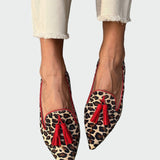 Mocassins à bout pointu ornés de franges