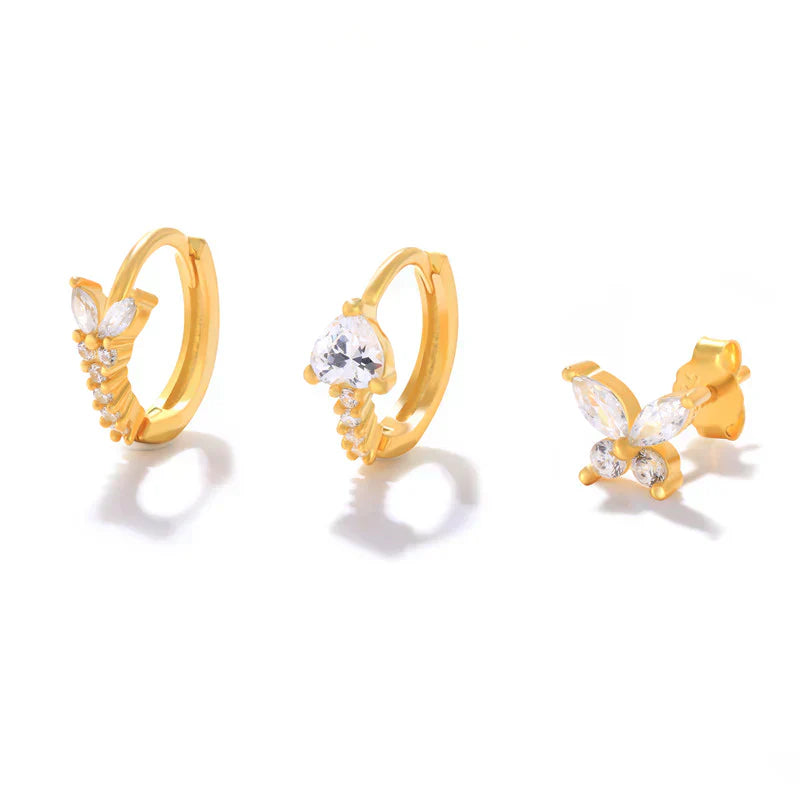 Eva-Marie – Boucles d'oreilles en or délicates au design fluide.