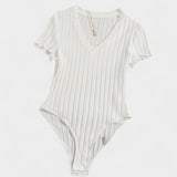 "Body avec Détails en Tubes" could be rewritten as "Body Élégant avec Accents en Tubes".