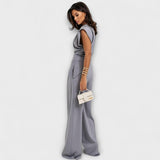 Asymmetrical Ensemble with Dramatic Shoulders