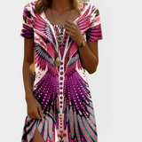 "Robe Vintage à Manches Courtes" can be rewritten as "Robe Vintage à Manches Courtes Élégante".