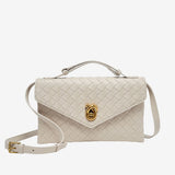 "Sofia | Mini Sac Bandoulière en Tissu Texturé" can be rewritten as "Sofia | Mini Sac Bandoulière en Tissu Texturé Chic".