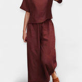 "Ensemble Aérien avec T-shirt à Manches Courtes" could be rewritten as "Ensemble Léger avec T-shirt à Manches Courtes".