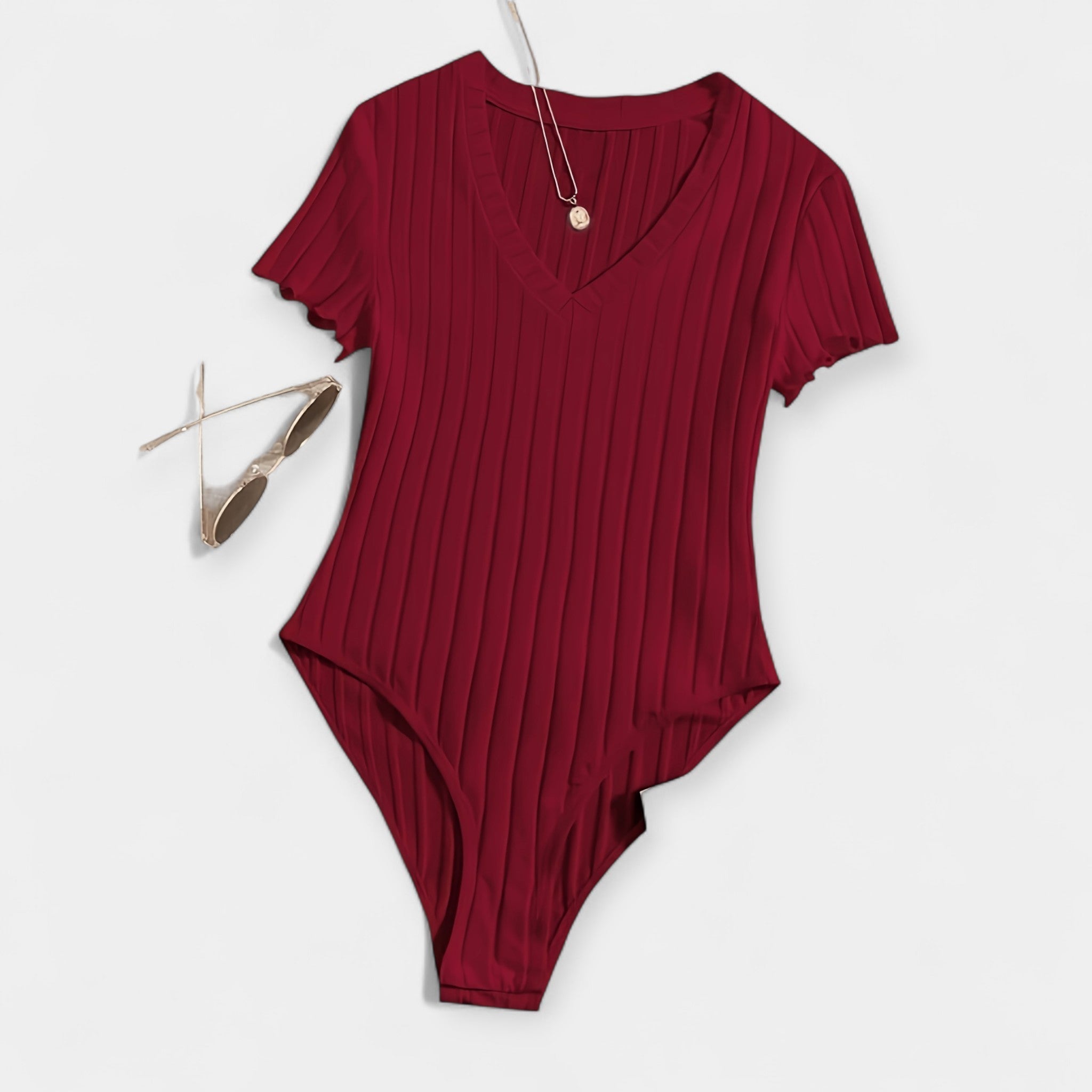 "Body avec Détails en Tubes" could be rewritten as "Body Élégant avec Accents en Tubes".