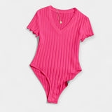 "Body avec Détails en Tubes" could be rewritten as "Body Élégant avec Accents en Tubes".