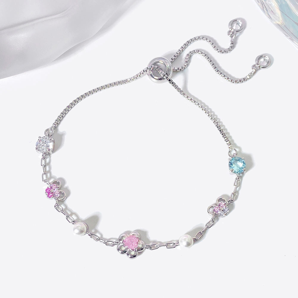 Dorota – Boucles d'oreilles en or sculptural avec perles élégantes.