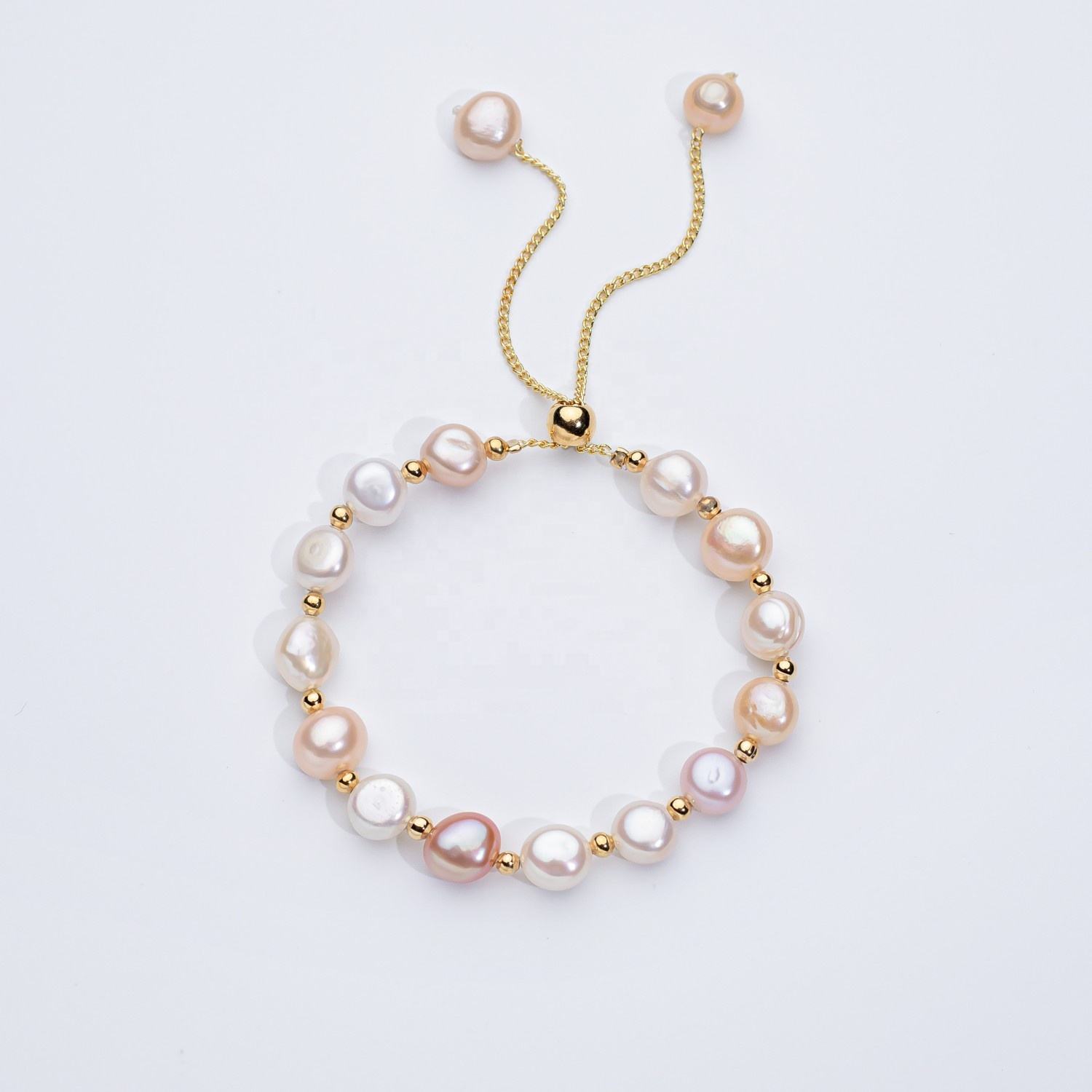 Carina – Boucles d'oreilles en or avec perles suspendues.