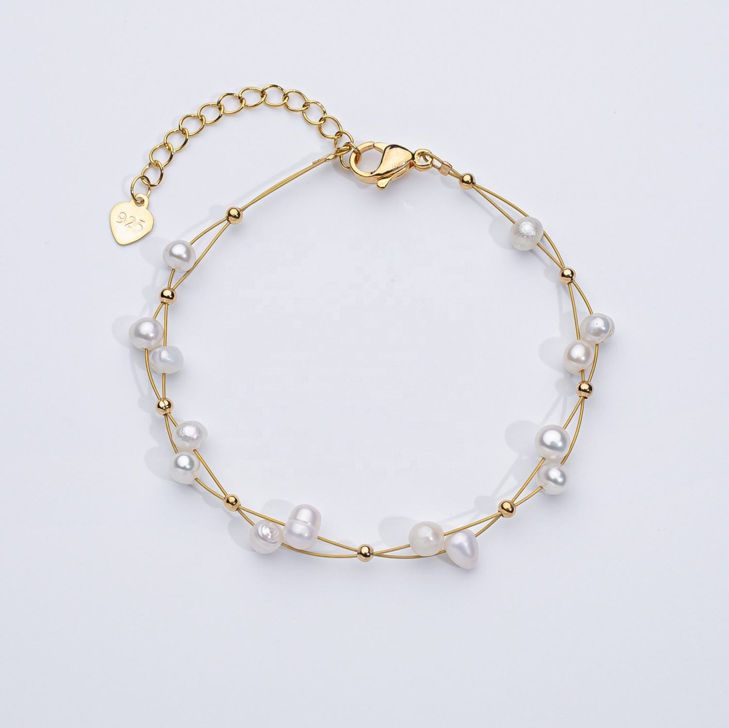 Marlena – Bracelet en or orné de perles.