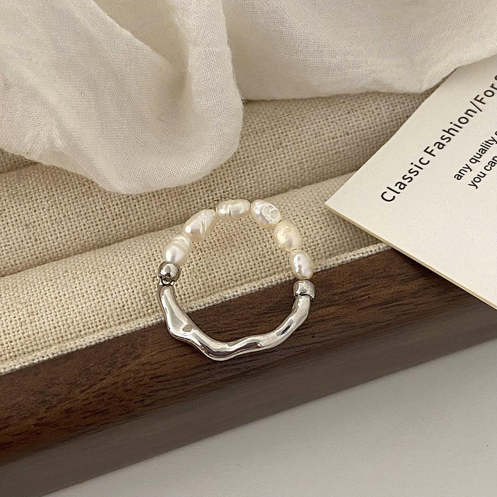 Elisa - Bague en perles amusante avec un cœur doré.