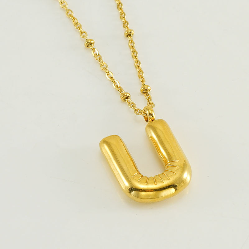 Irena – Collier doré avec pendentif en forme de lettre initiale