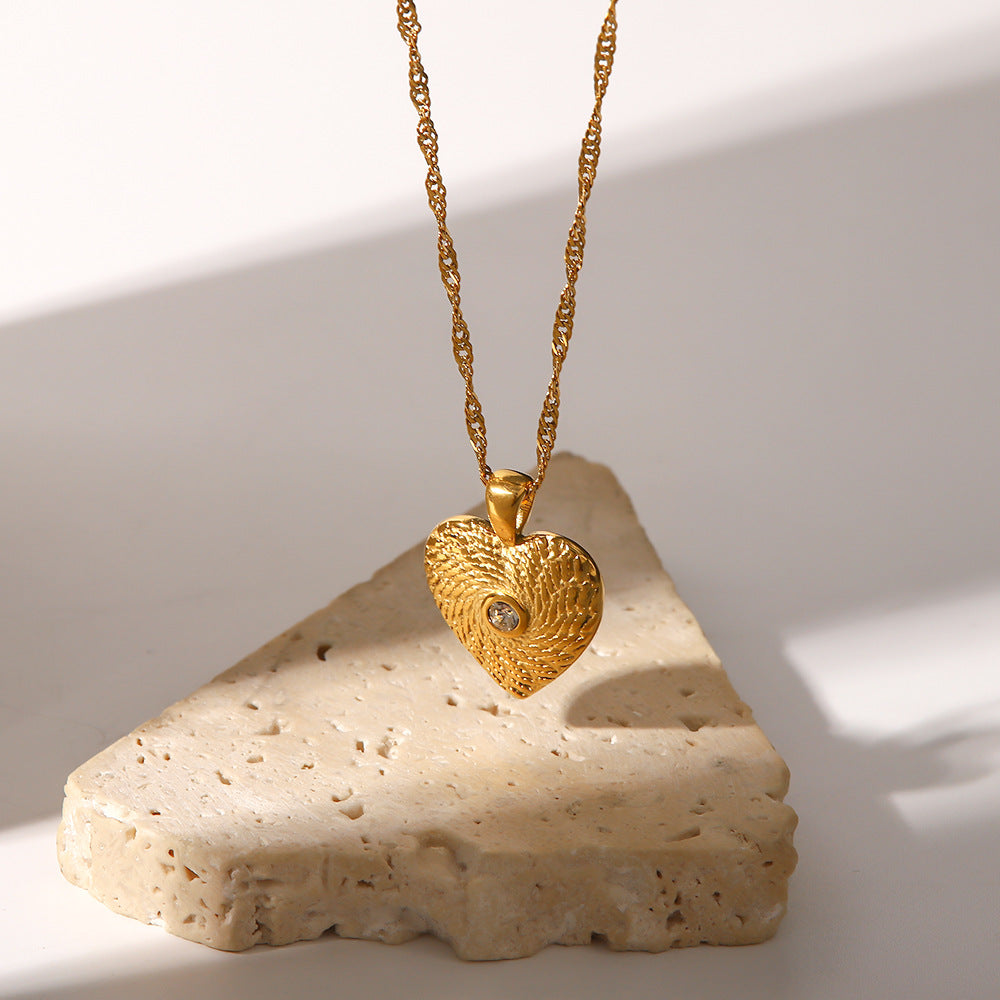 Elisabeth – Collier en or avec pendentifs symboliques délicats