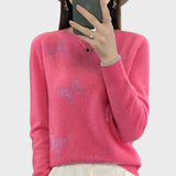 Col roulé à motif de papillons