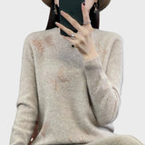 Col roulé à motif de papillons