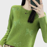 Col roulé à motif de papillons