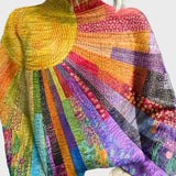 Pull col roulé à motif vibrant