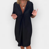 Robe chic à décolleté en V et ourlet orné