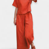 "Ensemble Aérien avec T-shirt à Manches Courtes" could be rewritten as "Ensemble Léger avec T-shirt à Manches Courtes".