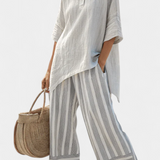 Ensemble Daisy : Top Asymétrique et Pantalon Rayé pour un Look Élégant et Contemporain