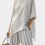 Ensemble Daisy : Top Asymétrique et Pantalon Rayé pour un Look Élégant et Contemporain