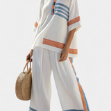 Ensemble Ethnique Daisy Blanc avec Détails Bleus et Oranges – Un Style Unique et Éclatant